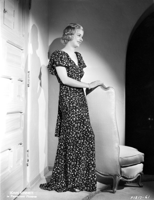 Joan Bennett wearing a Long Glittering Dress Photo Print - Item # VARCEL694118