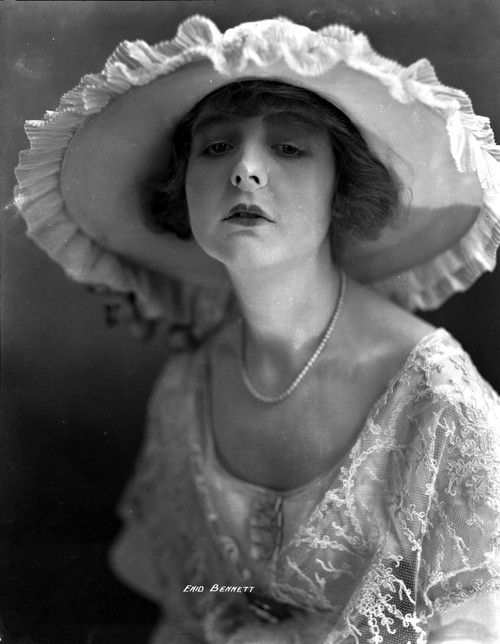Enid Bennett on an Embroidered Dress with a Hat Portrait Photo Print - Item # VARCEL694163