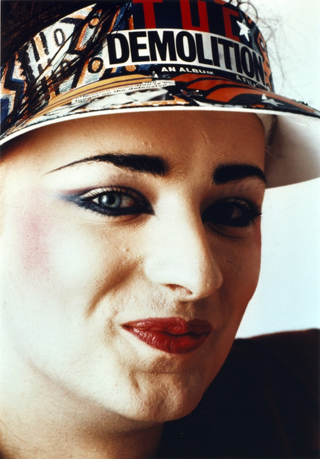Boy George Woman's smiling wearing Sun Visor Cap Close Up Portrait Photo Print - Item # VARCEL694289