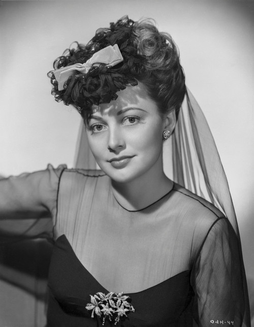 Olivia DeHavilland Seated in Gown Photo Print - Item # VARCEL694346