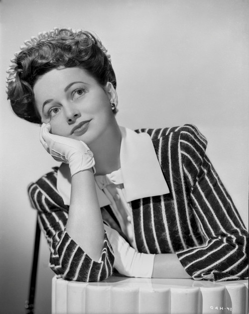 Olivia DeHavilland Leaning Chin on Hand with Stripes Blazer Photo Print - Item # VARCEL694357