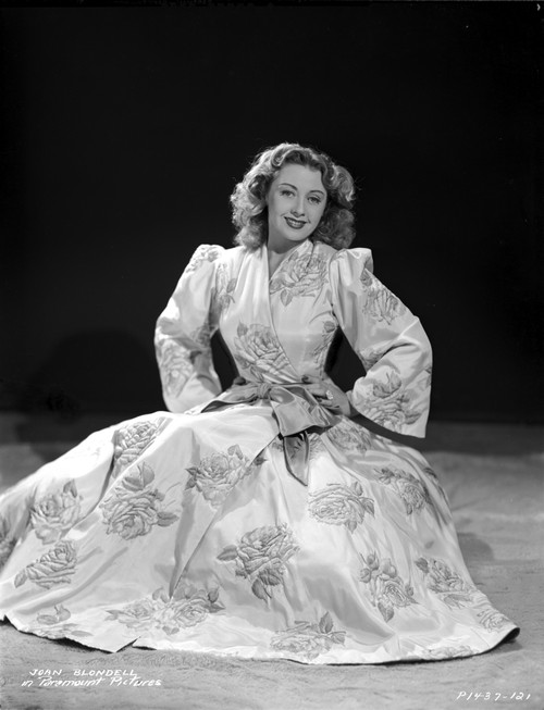 Joan Blondell on Printed Dress and sitting Photo Print - Item # VARCEL694368