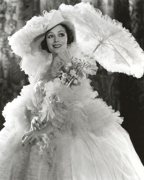 Dolores Del Rio Posed wearing White Gown with Umbrella Photo Print - Item # VARCEL694425