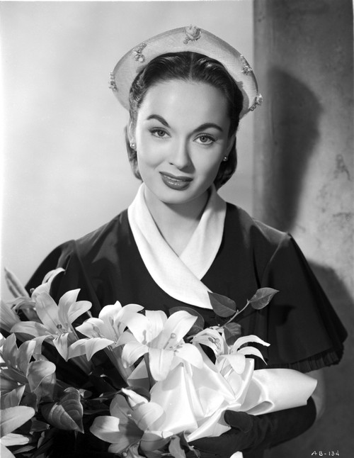 Ann Blyth Carrying a Flowers Photo Print - Item # VARCEL694436