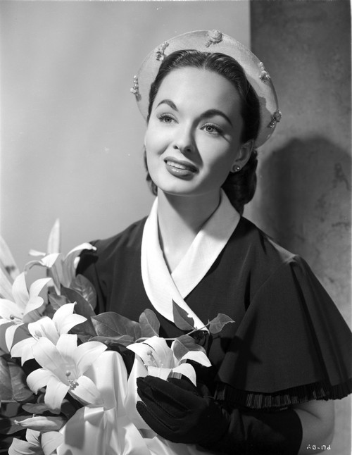 Ann Blyth Carrying a Flowers and smiling Photo Print - Item # VARCEL694440