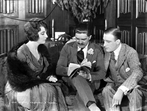 Betty Blythe sitting and Discussing with Two Men Photo Print - Item # VARCEL694497