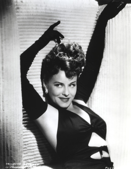 Paulette Goddard Posed with Hands Upwards wearing Sexy Black Outfit with Gloves Photo Print - Item # VARCEL694626