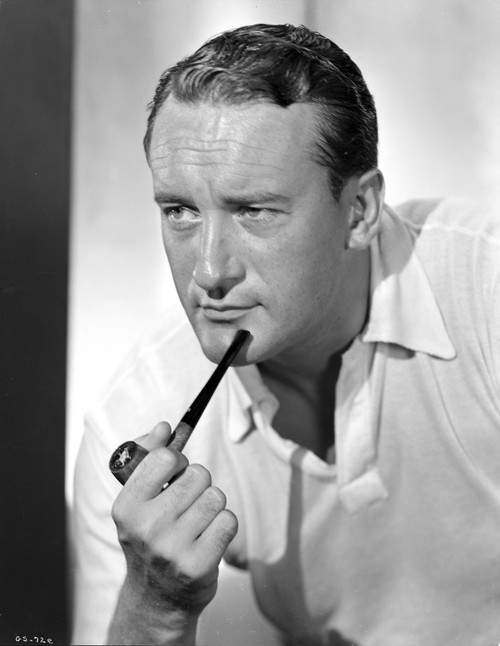 A Portrait Of George Sanders Smoking A Pipe Photo Print - Item # VARCEL694669