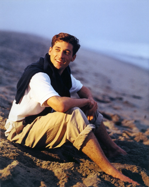 Patrick Dempsey sitting on Mountain Photo Print - Item # VARCEL694702