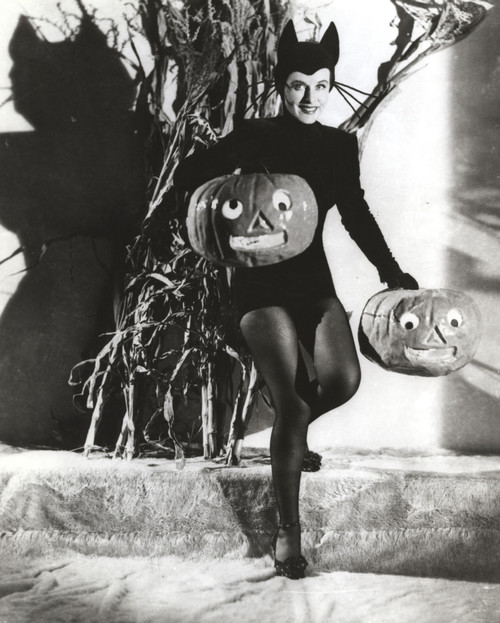 Paulette Goddard Posed with Pumpkin Photo Print - Item # VARCEL694749