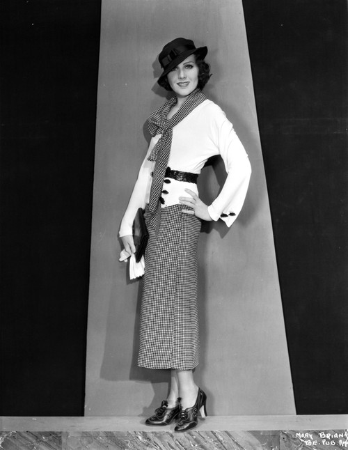 Mary Brian standing in White Coat Photo Print - Item # VARCEL694782