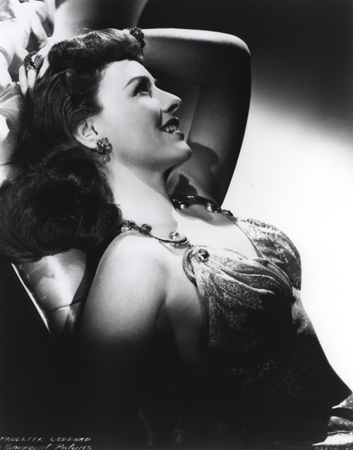 Paulette Goddard Looking Up while Lying, wearing Sexy Dress Portrait Photo Print - Item # VARCEL694807