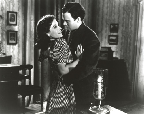 Paulette Goddard Posed with a Man Photo Print - Item # VARCEL694799