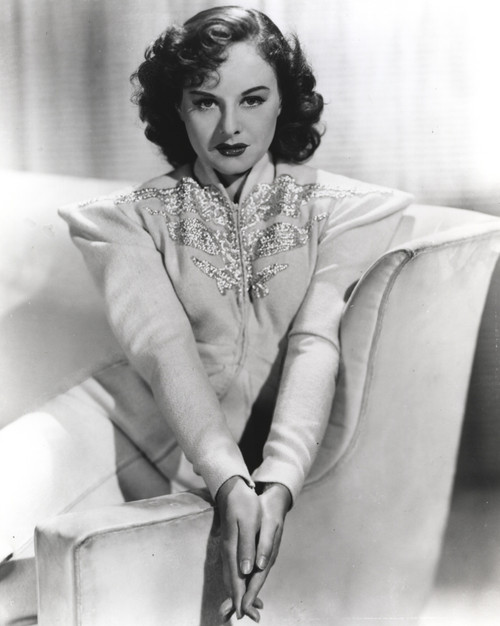 Paulette Goddard Seated on Couch wearing Formal Dress Portrait Photo Print - Item # VARCEL694826