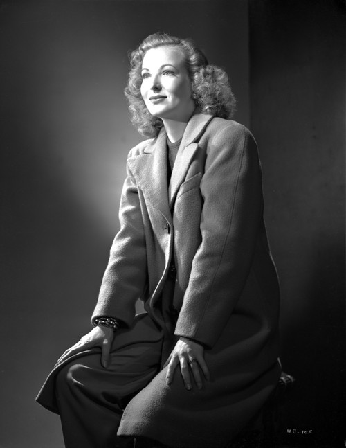 Hillary Brooks sitting in Coat and Hands on Lap Photo Print - Item # VARCEL694918