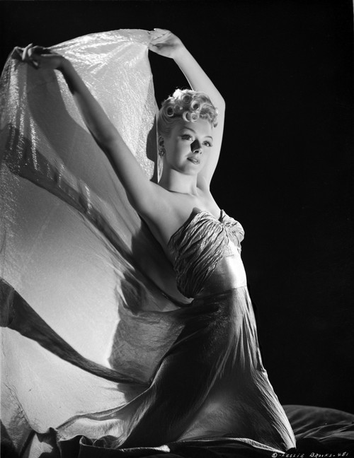 Leslie Brooks Posed in Gown with Shawl in Black Background Photo Print - Item # VARCEL694958