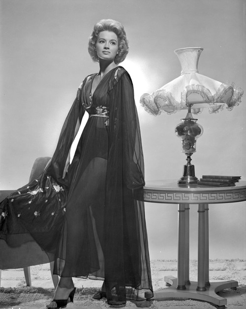Angie Dickinson standing wearing Dress Black and White Photo Print - Item # VARCEL694961