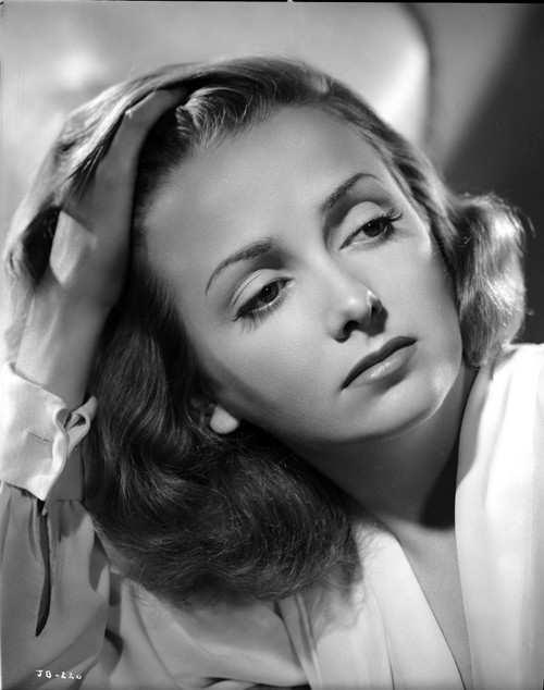 Jean Brooks Portrait in White Linen Long Sleeve Dress with Right Hand on the Head while Eyes Looking to the Left Photo Print - Item # VARCEL694985