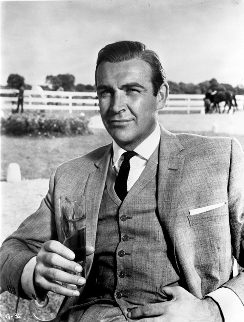 Goldfinger Man Holding Glass of Wine wearing Formal Outfit with Necktie Photo Print - Item # VARCEL695008