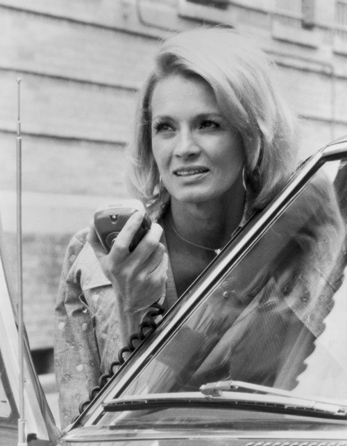 Angie Dickinson Holding Her Phone Outside the Car in Classic Close Up Portrait Photo Print - Item # VARCEL695101