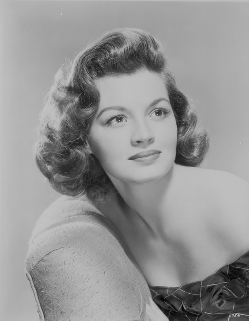 Angie Dickinson Leaning on the Chair and Looking Away in Classic Close Up Portrait Photo Print - Item # VARCEL695109
