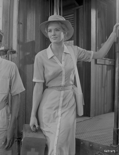 Angie Dickinson standing in Casual Formal Dress Black and White Photo Print - Item # VARCEL695158