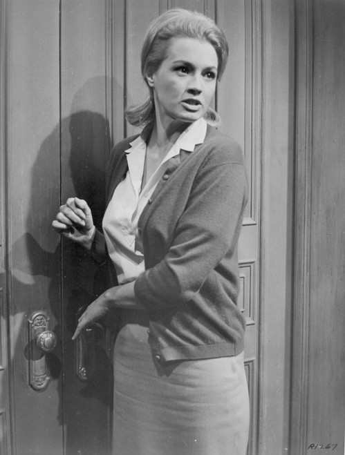 Angie Dickinson Leaning on Door in Office Outfit Photo Print - Item # VARCEL695194