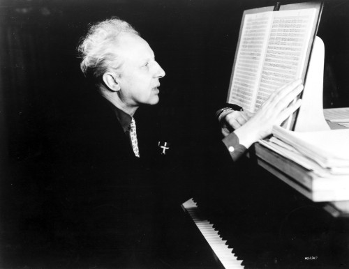 Leopold Stokowski at a piano Photo Print - Item # VARCEL695221
