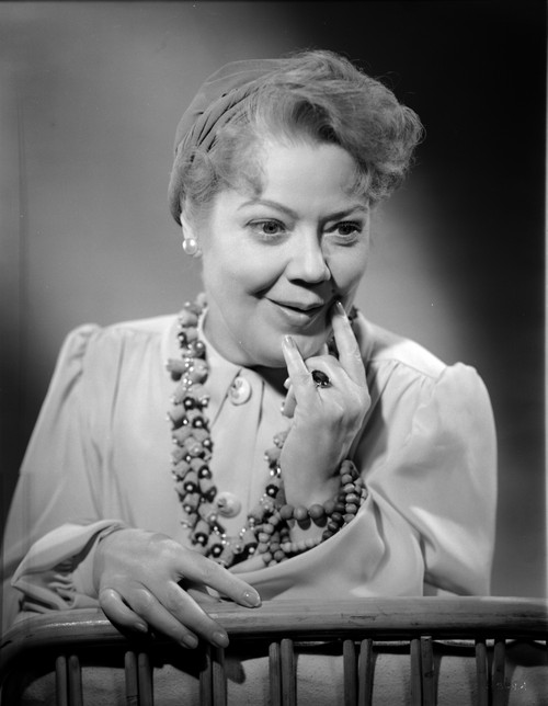 Spring Byington Reclining Pose in Black and White Portrait wearing Formal Dress Photo Print - Item # VARCEL695306