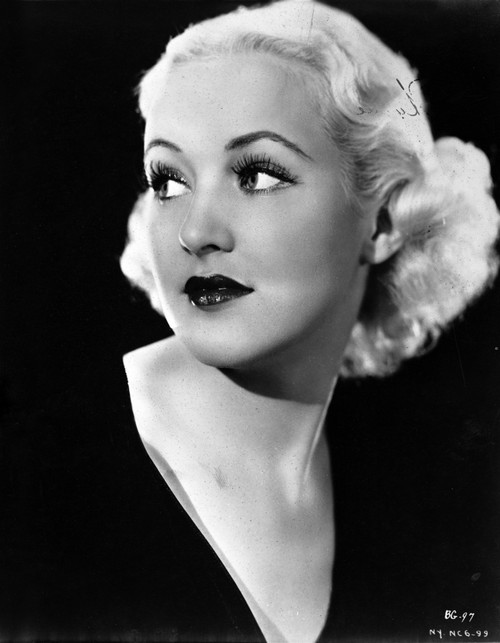 Betty Grable Posed in Black Dress Photo Print - Item # VARCEL695327