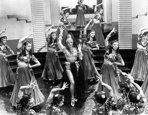 Marlene Dietrich Dancing in Sexy Dress with Dancers Photo Print - Item # VARCEL695328
