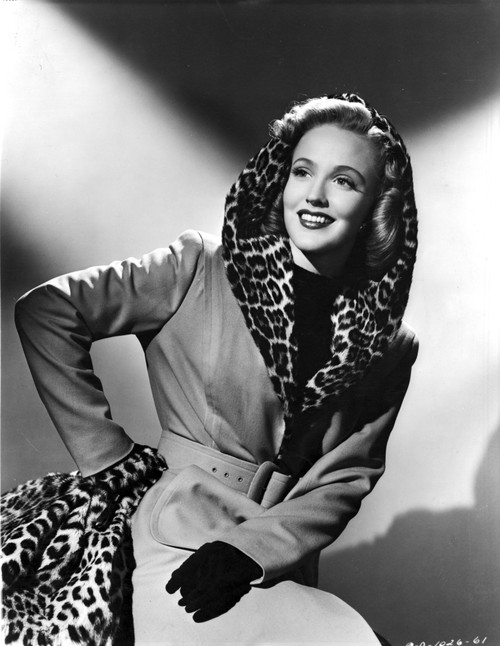 Georgia Carroll Posed in Leather Coat with Black Hand Gloves Photo Print - Item # VARCEL695358