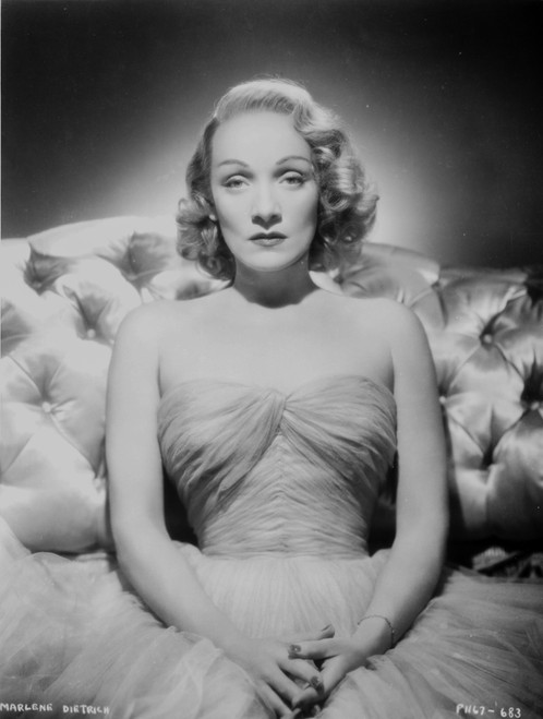 Marlene Dietrich Portrait on a Couch wearing Dress Photo Print - Item # VARCEL695379