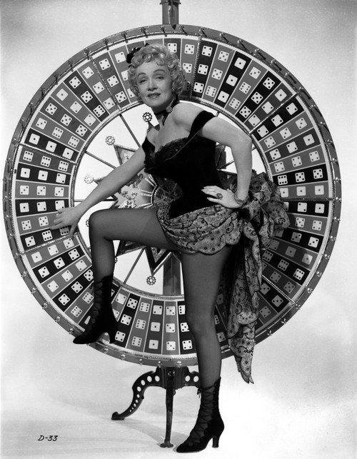 Marlene Dietrich standing One Leg in Black Lingerie with Heels Photo Print - Item # VARCEL695383