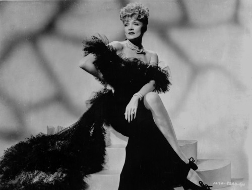 Marlene Dietrich sitting in Black Dress with Black Shawl Photo Print - Item # VARCEL695413