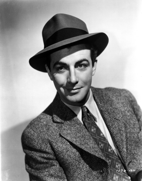 Robert Taylor Posed in Suit and Hat Photo Print - Item # VARCEL695431