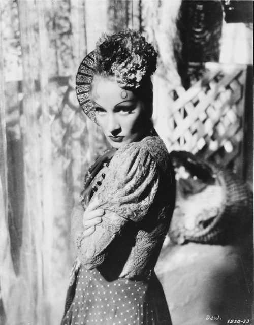 Marlene Dietrich Looking Away in Black Dress with Curly Hairstyle Photo Print - Item # VARCEL695428