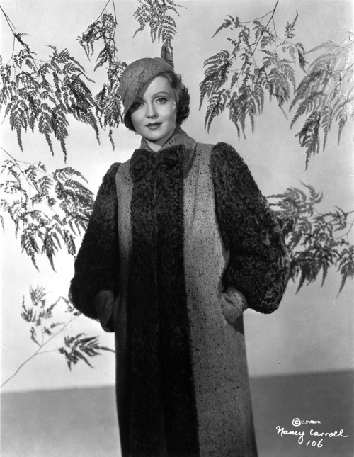 A Portrait Of Nancy Carrol Wearing A Coat Photo Print - Item # VARCEL695452