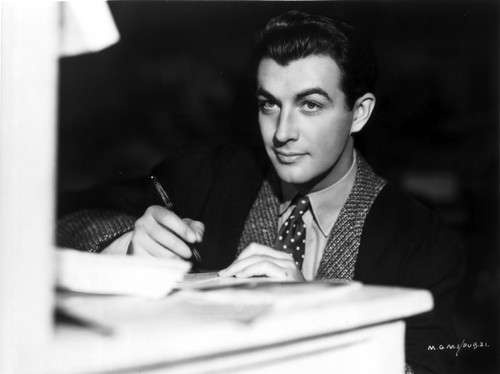 Robert Taylor Writing on Paper in Suit Photo Print - Item # VARCEL695459