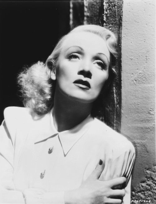 Marlene Dietrich Leaning on Wall, wearing White Neat Blouse Photo Print - Item # VARCEL695470