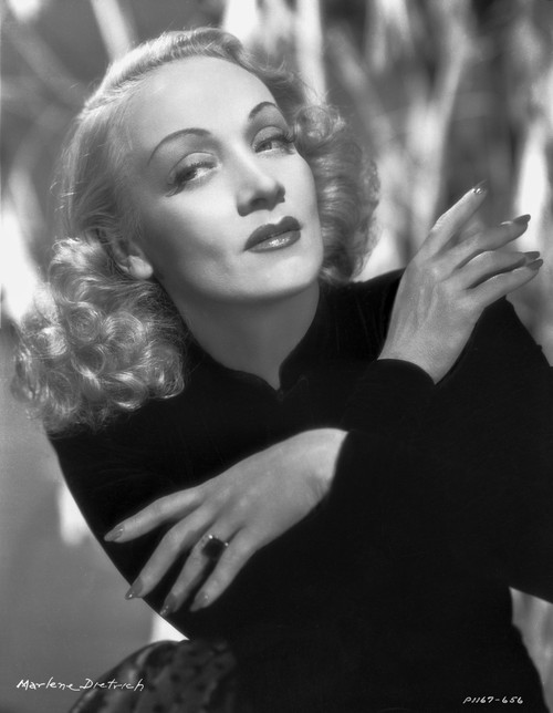 Marlene Dietrich Posed in Black Suit with Arm's Cross Photo Print - Item # VARCEL695499