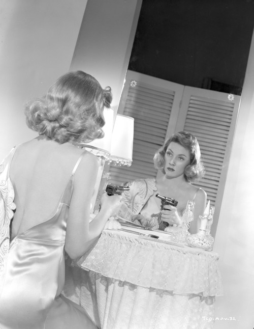 Gloria Grahame Looking in a Mirror in Backless Dress Photo Print - Item # VARCEL695516