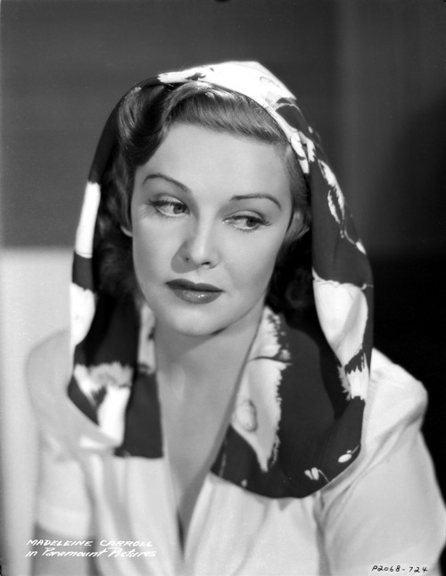 Madeleine Carroll Looking Don in Blouse with Black and White Scarf on Her Head Photo Print - Item # VARCEL695545