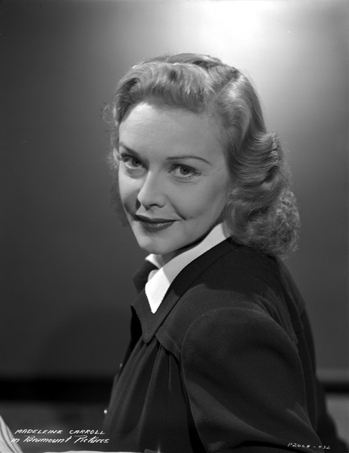 Madeleine Carroll smiling in Black Dress with White Collar Portrait Photo Print - Item # VARCEL695596