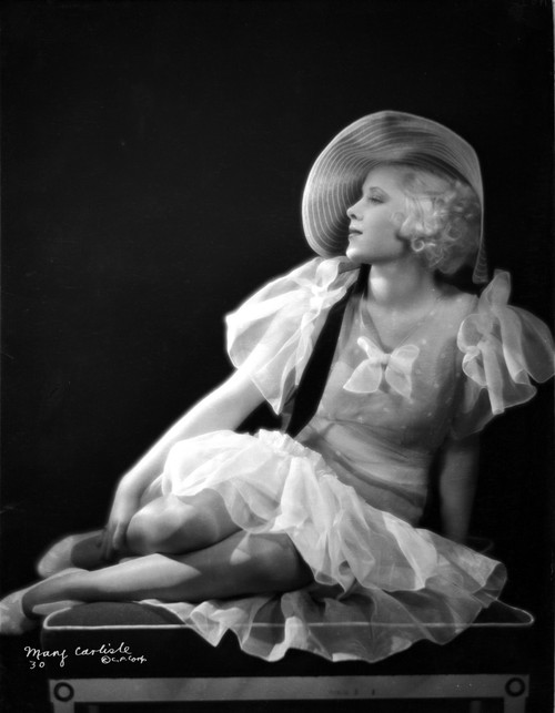 Mary Carlisle Seated in White Dress with Hat Photo Print - Item # VARCEL695696