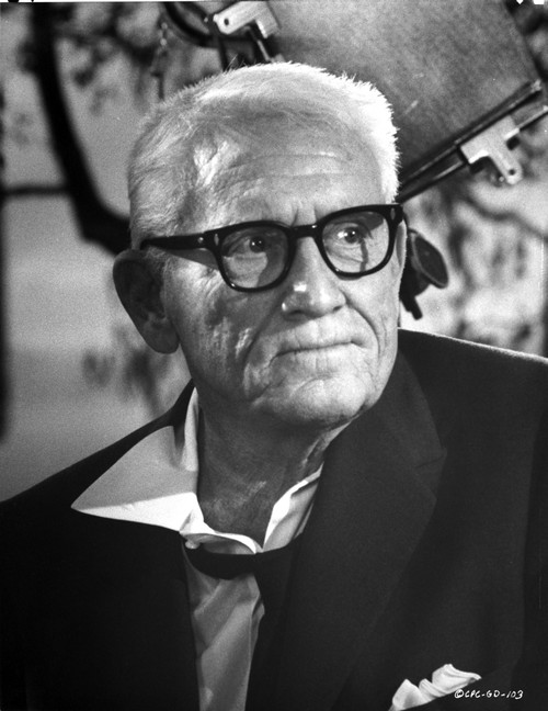 Spencer Tracy Cast Member Looking Away wearing Formal Suit with Eyeglasses in Black and White Portrait Photo Print - Item # VARCEL695724