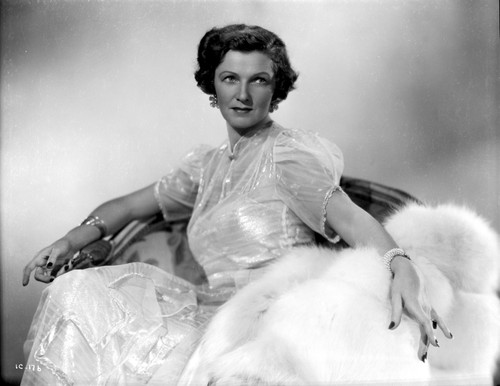 Irene Castle Leaning Sideways with White Coat Photo Print - Item # VARCEL695779