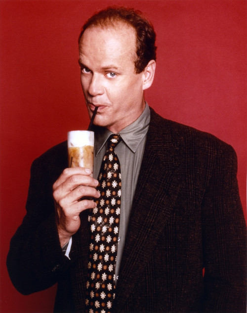 Kelsey Grammer Posed in a Suit and Tie with Red Background Photo Print - Item # VARCEL695816