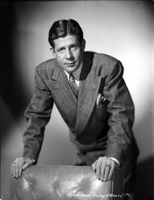 A Portrait Of Rudy Vallee Leaning on A Chair Photo Print - Item # VARCEL695897