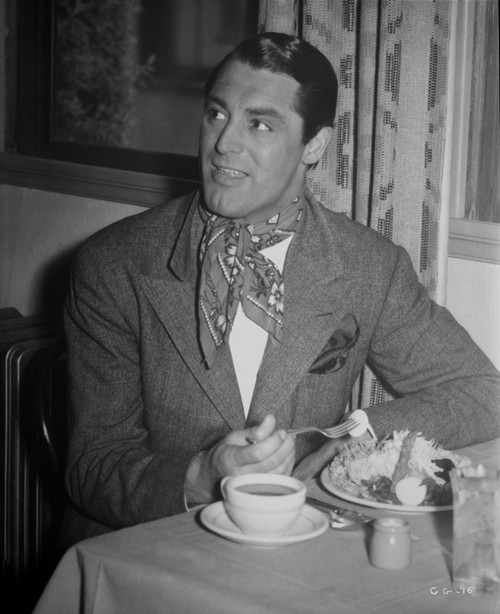 Cary Grant eating in a scarf and jacket Photo Print - Item # VARCEL695912